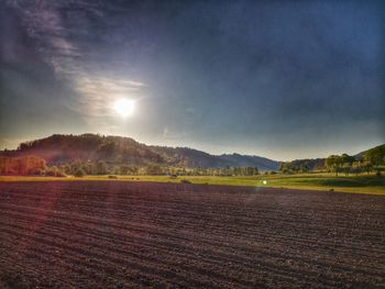 Scenic view of field against sky