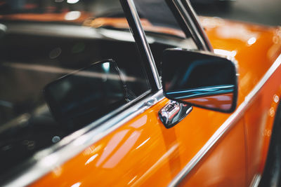 Close-up of car on side-view mirror