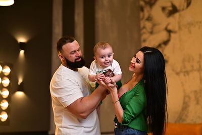 Portrait of mother and daughter at home
