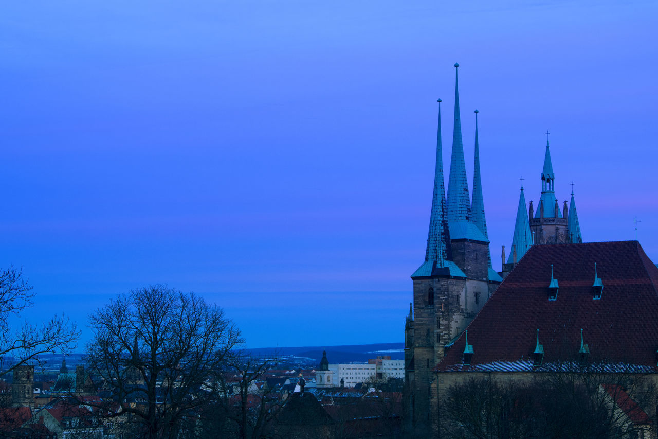 CHURCH AGAINST BLUE SKY