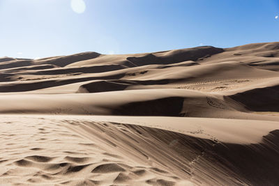 Scenic view of desert against sky