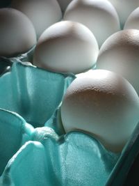 High angle view of eggs in crate