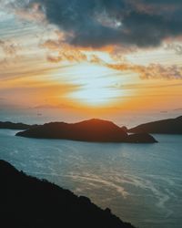 Scenic view of sea against sky during sunset