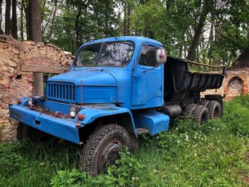 Abandoned truck on field