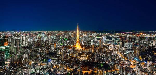 Illuminated buildings in city at night