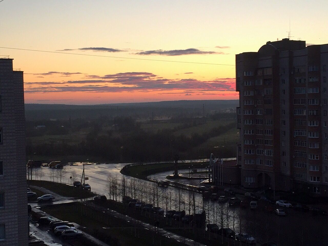 HIGH ANGLE VIEW OF CITY BUILDINGS DURING SUNSET