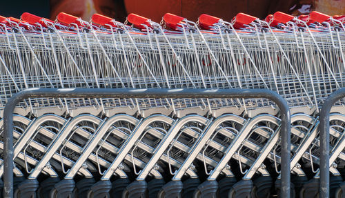 Stack of shopping carts outdoors