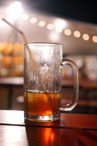 Close-up of beer glass on table