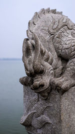 Close-up of statue against clear sky