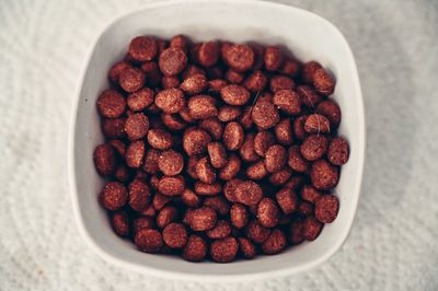 High angle view of strawberries in bowl on table