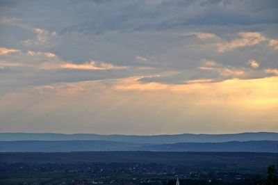 Scenic view of landscape against sky during sunset