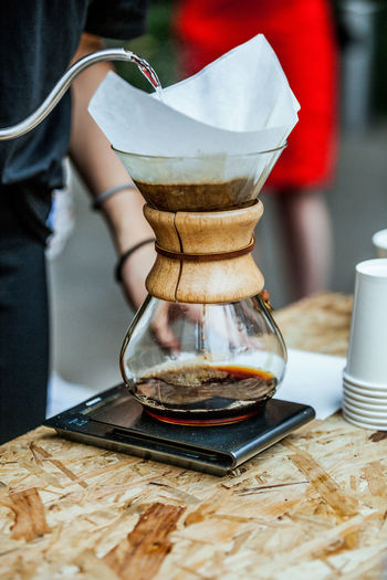 Close-up of filter coffee in jar on table