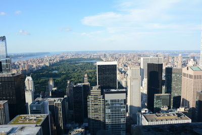 High angle view of city against cloudy sky