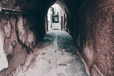 Narrow alley amidst buildings