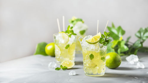 Fruits in glass on table