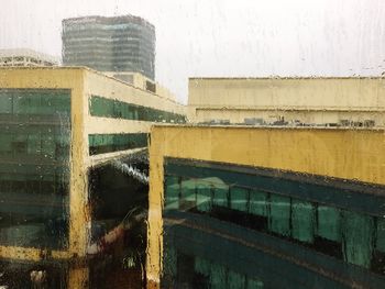Close-up of wet window during rainy season