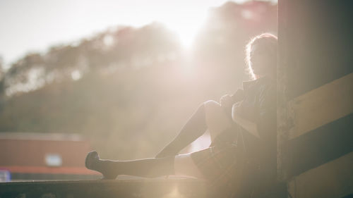 Close-up of woman against sky