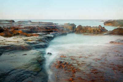 Scenic view of sea against clear sky