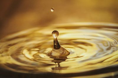 Close-up of drop splashing in water