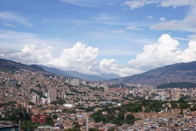 Aerial view of townscape against sky