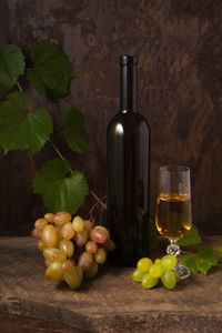 Close-up of wine bottles on table