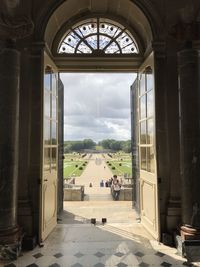 People seen through window