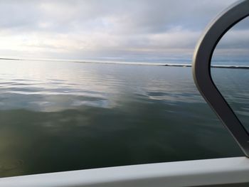 Scenic view of sea seen through window