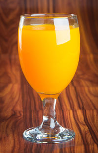 Close-up of beer glass on table