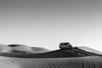 Scenic view of desert against clear sky