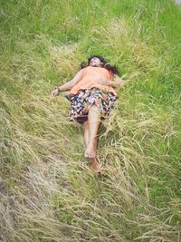 Full length of woman walking on field