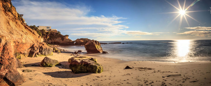 Scenic view of beach against sky