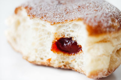 Close-up of bread over white background