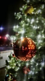 Close-up of illuminated christmas tree