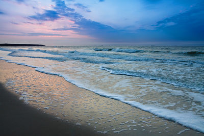 View of beach at dusk