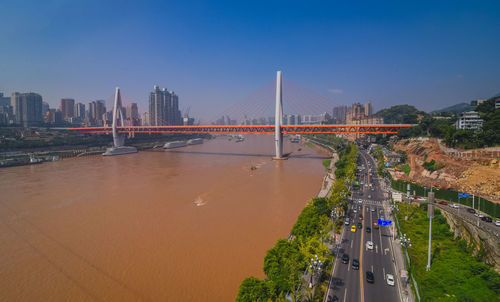 Panoramic view of suspension bridge against clear sky