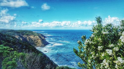 Scenic view of sea against blue sky