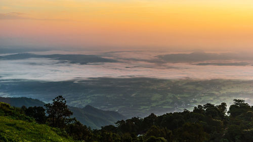 Scenic view of cloudscape against sky during sunset