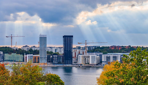 Buildings in city against sky