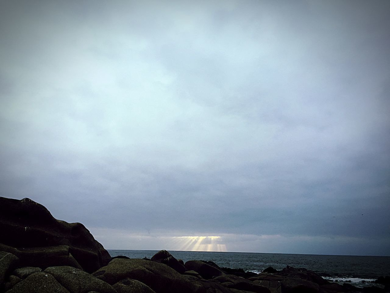 sky, cloud - sky, sea, water, beauty in nature, rock, scenics - nature, tranquility, rock - object, tranquil scene, beach, nature, solid, land, horizon, horizon over water, overcast, day, no people, outdoors