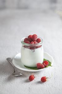 Close-up of raspberry dessert on table