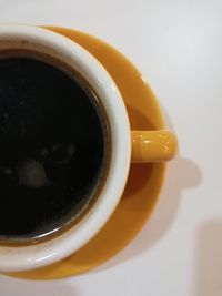 Directly above shot of black coffee in cup
