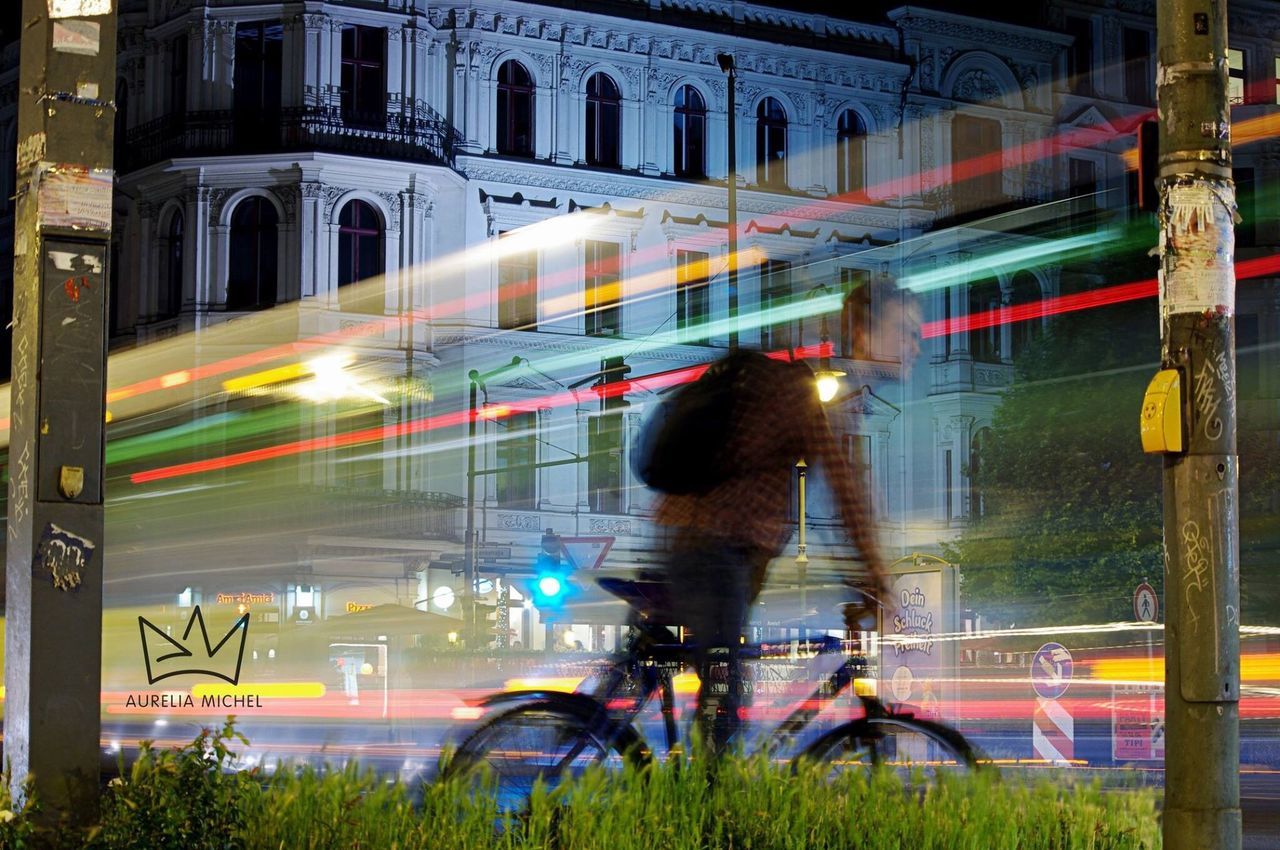 architecture, built structure, building exterior, lifestyles, transportation, motion, men, blurred motion, leisure activity, long exposure, mode of transport, city, person, speed, land vehicle, night, on the move, city life