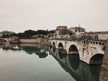 Reflection of bridge in water