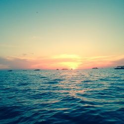 Scenic view of sea at sunset