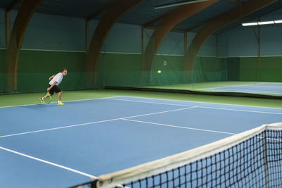 Man playing tennis