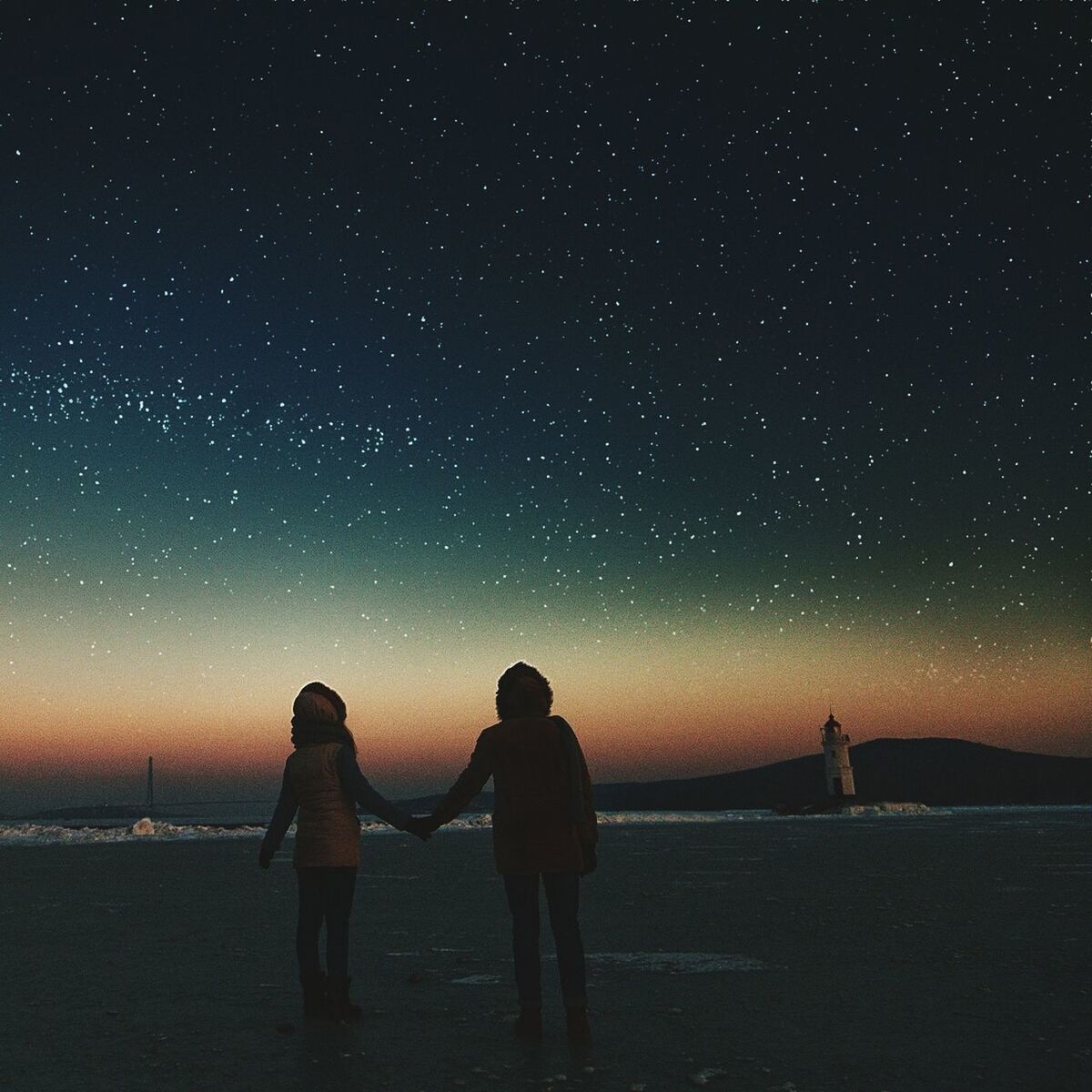 night, rear view, standing, lifestyles, men, silhouette, leisure activity, sky, scenics, dark, tranquil scene, illuminated, tranquility, beach, full length, person, nature