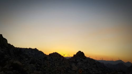 Scenic view of mountains at sunset