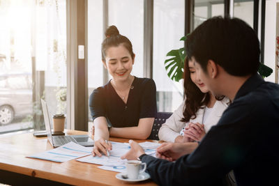 Business colleagues working at office