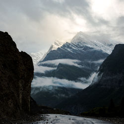 Scenic view of snowcapped mountains against sky