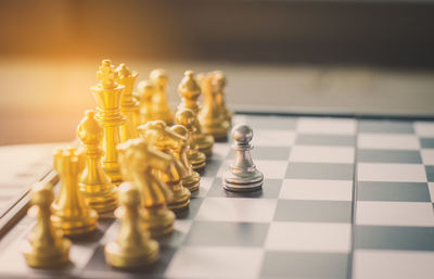 Close-up of chess pieces on board